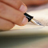 Hand with pen
